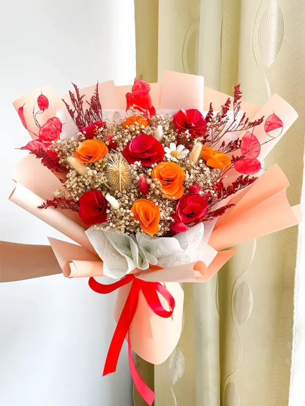 Ramo grande de flores secas en color rojo y naranja