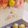 caja_alore_con_chocolates logotipo de alore en una caja con chocolates ferrero rocher