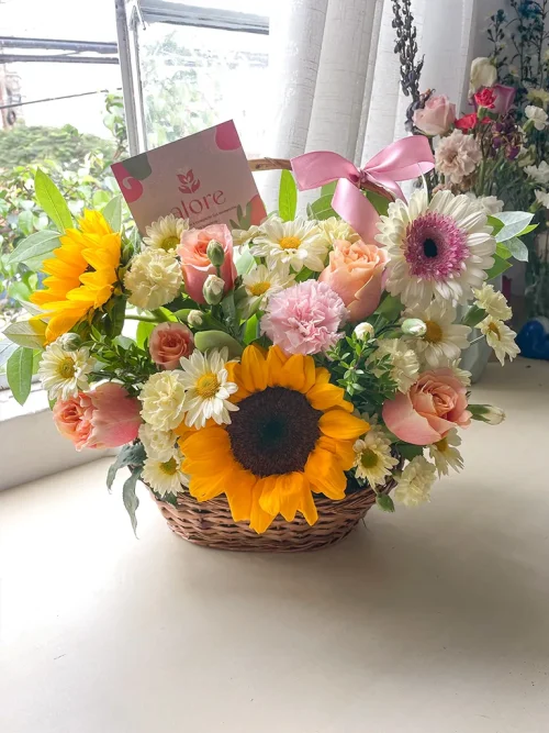 canasta_de_flores_amarillas canasta floral con girasoles, gerberas y margaritas