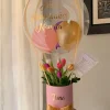 arreglo floral con tulipanes y globo arreglo floral con tulipanes y globo