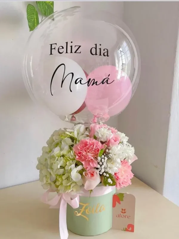 arreglo foral en tonos rosas con globo arreglo foral en tonos rosas con globo