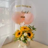 box de girasoles y globo burbuja