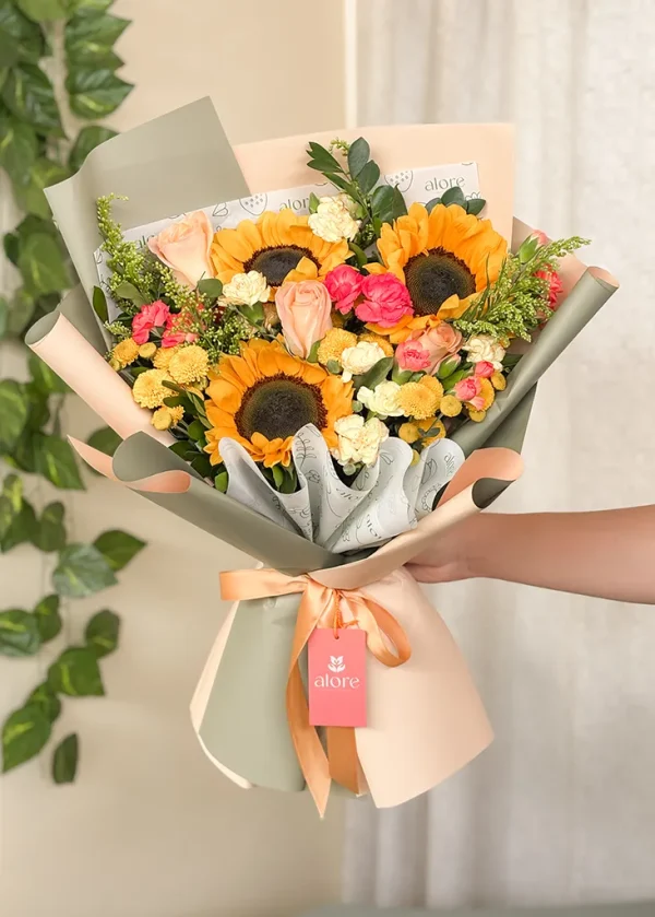 ramo de girasoles y rosas melón