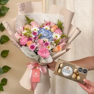 Ramo de flores con chocolates Ferrero Rocher.