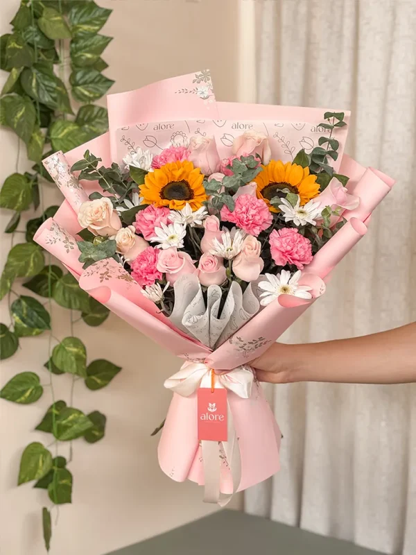 ramo con girasoles y rosas rosadas