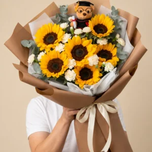 ramo de girasoles con peluche de graduacion beige