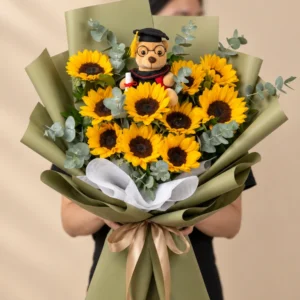 ramo de girasoles con peluche de graduacion verde